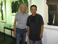 Michel Nau with Yang Xiaojian